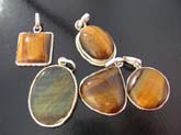 Stylish tigers eye stoned high quality 925 sterling silver  pendant. Varity design randomly choosed by our order pickers.