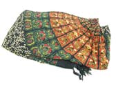 Circular fan crest on colorful batik shawl