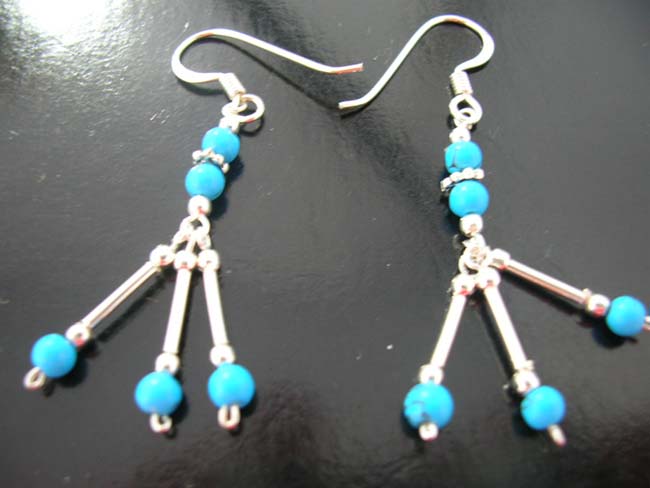 Sterling silver fashions, turquoise gems, handmade earrings, beaded jewelry, high style fashions