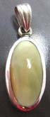 Oval shape yellow seashell inaly sterling silver pemdant