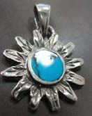 Sun flower pattern sterling silver pendant with rounded abalone seashell embedded in middle