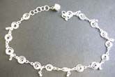 Genius Thailand made sterling silver ankle bracelet ( anklets) with multi smiling face pattern and S knot 