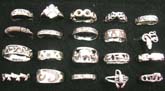 Large facing on trendy 925. sterling silver rings in an assortment of designs.