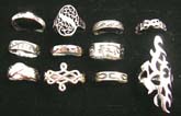 Solid 925. sterling silver fashion rings in an assortment of designs. 